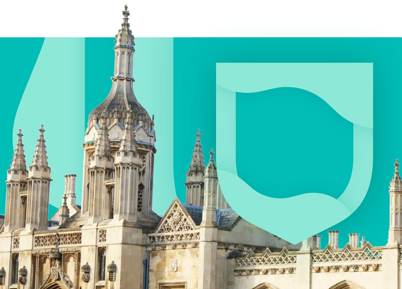 Building with green shield symbolizing Cambridge values